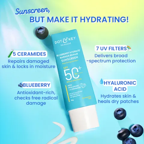 Blue tube of Dot & Key sunscreen SPF 50+ with blueberries and ingredient highlights.