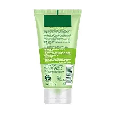 Back of a green cosmetic tube with product information and a barcode.