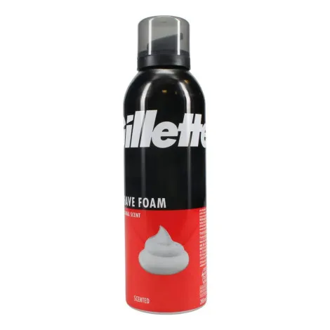Gillette shaving foam can with black and red packaging and a clear plastic cap.
