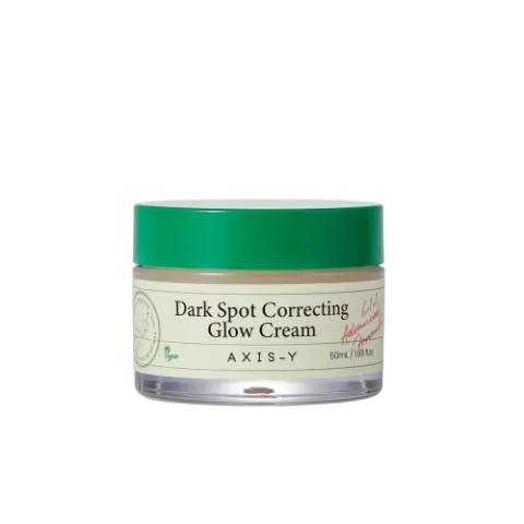 সবুজ ঢাকনাযুক্ত একটি ডার্ক স্পট করেক্টিং গ্লো ক্রিমের কাচের জার