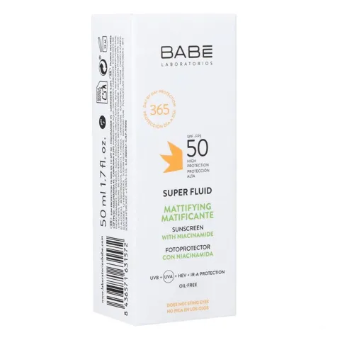 White rectangular box of Babe Super Fluid sunscreen with SPF 50 text and orange accents.