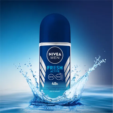Nivea Men Fresh Active deodorant stick with water splashing around it on a blue background.