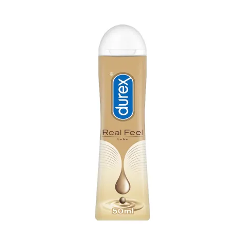 Durex Real Feel lubricant bottle with a gold label and white cap.