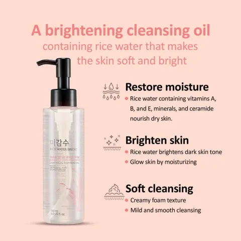 Clear cleansing oil bottle with pump on a pink background and product benefit text.