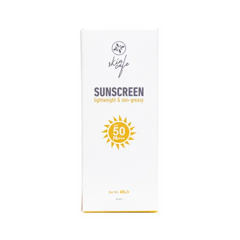 White sunscreen box with SPF 50 label and yellow sun graphic on the front.