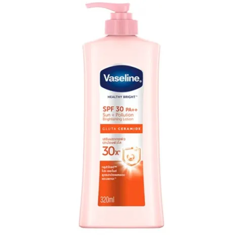 Vaseline Healthy Bright SPF 30 body lotion in a pink pump bottle.