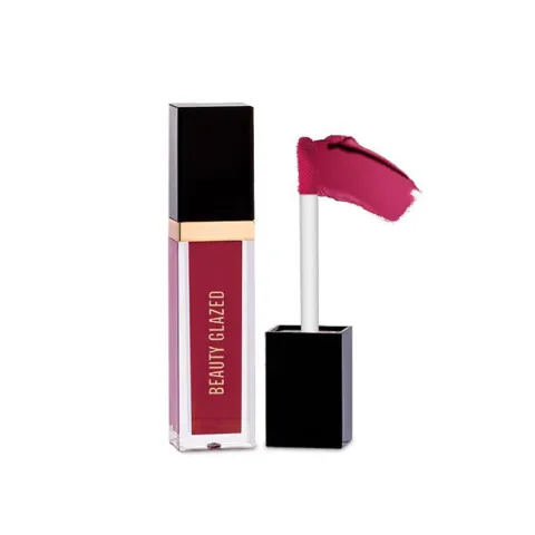 Liquid lipstick tube with dark pink applicator and gold accent on the cap.