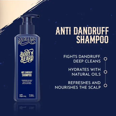 Dark blue bottle of anti-dandruff shampoo with text highlighting its benefits.