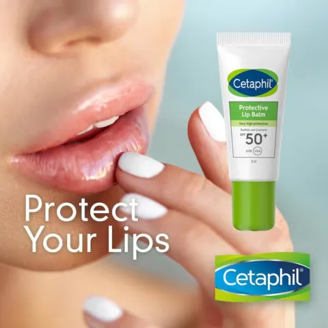 Woman applying Cetaphil lip balm with SPF 50+, close-up of lips and product tube.
