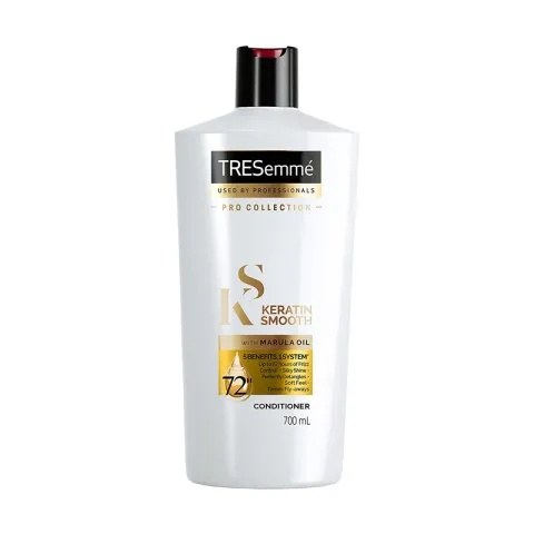 White TRESemmé Keratin Smooth shampoo bottle with black cap and gold label accents.