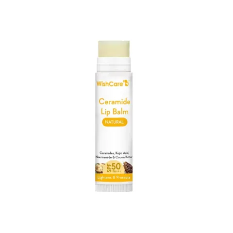 White and yellow tube of ceramide lip balm standing upright on a white background.