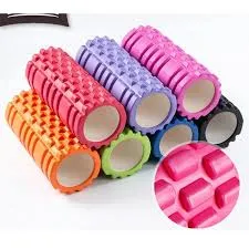 Colorful textured foam rollers stacked, with a close-up of the roller’s surface pattern.