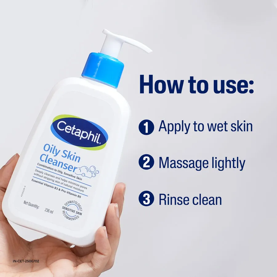 Hand holding Cetaphil Oily Skin Cleanser pump bottle next to usage instructions.
