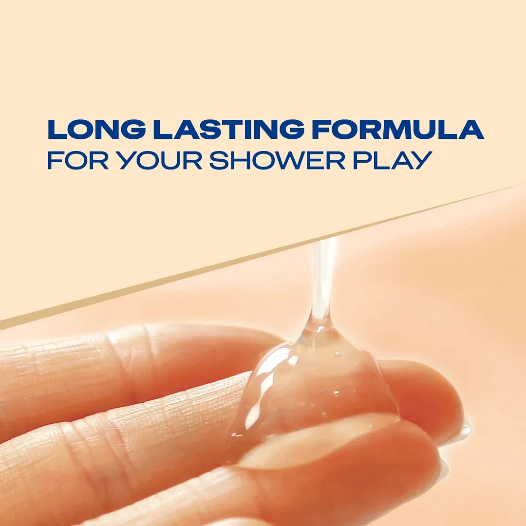 Clear gel being dispensed onto fingers against a peach background.