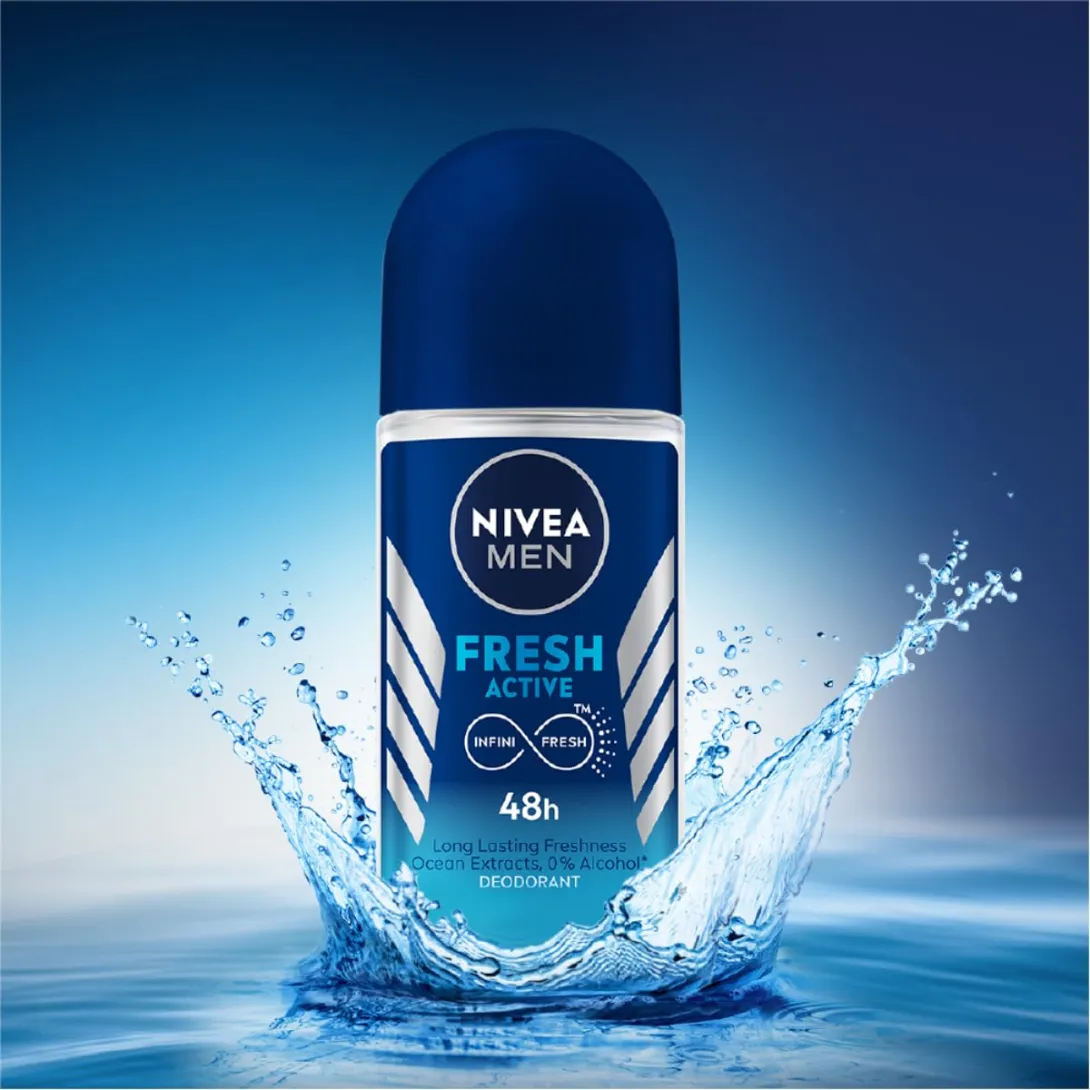 Nivea Men Fresh Active deodorant stick with water splashing around it on a blue background.
