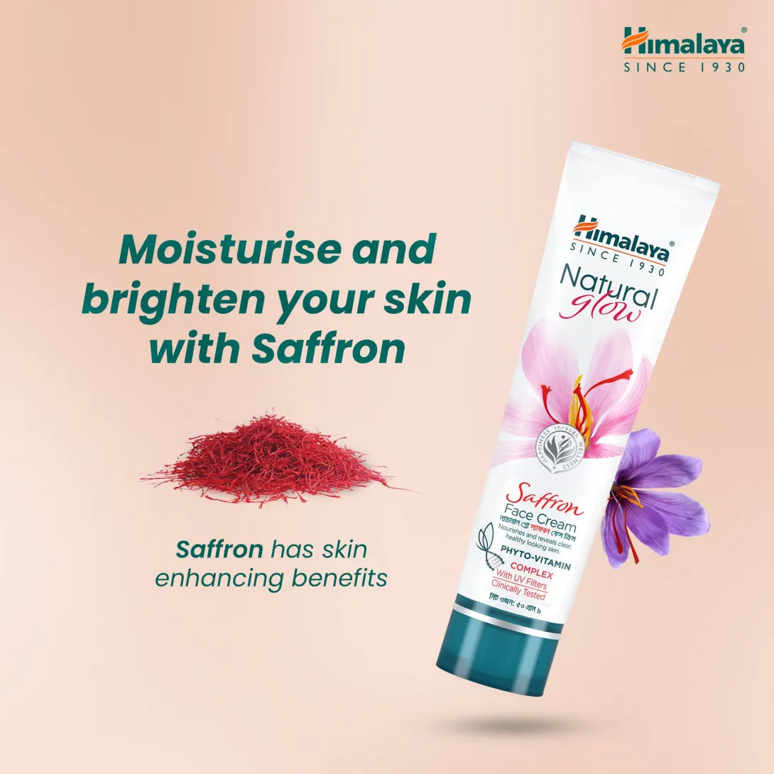 Himalaya face wash tube with saffron strands and a saffron flower on a peach background.