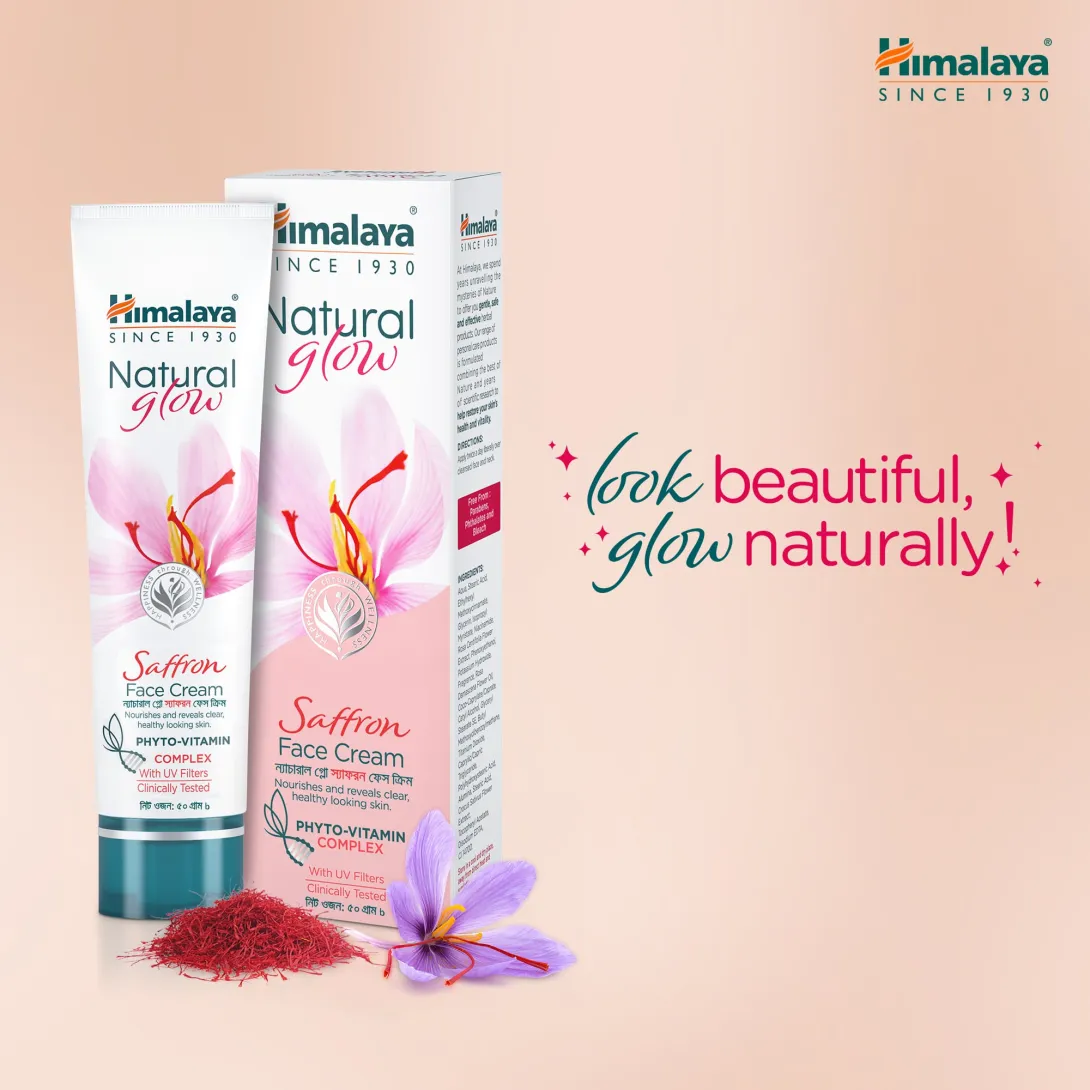 Himalaya Natural Glow Saffron Face Cream tube and box with saffron and pink flower.