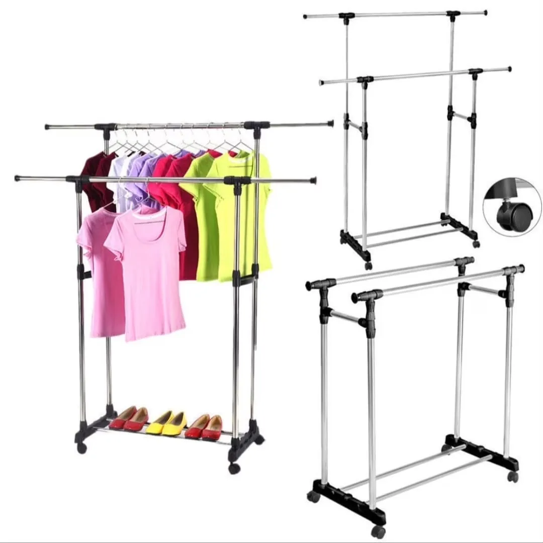 Double rail clothes rack with shirts, shoes, and adjustable metal frame on wheels.
