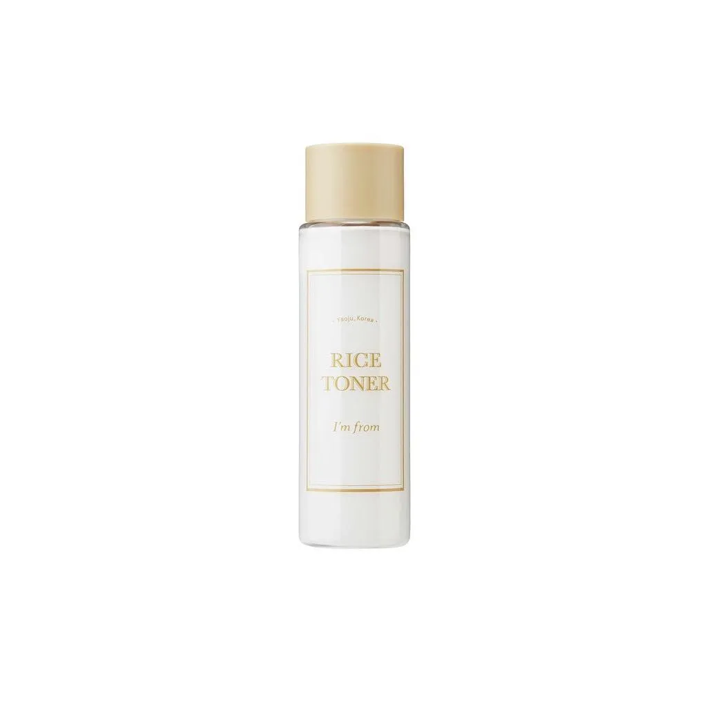 White skincare toner bottle with gold cap and minimalist label design.